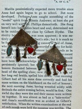 Earrings, pyramid with hanging charms.